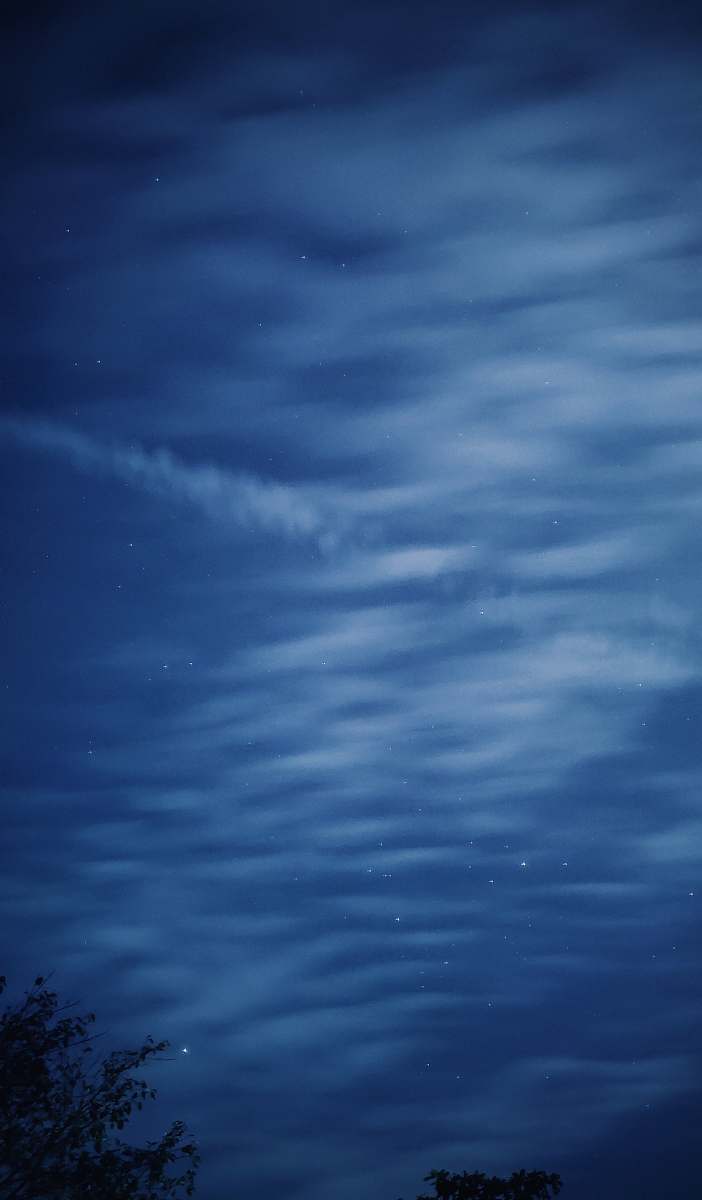 mala elanthikkara road white clouds under blue sky at nighttime photo pooppathy